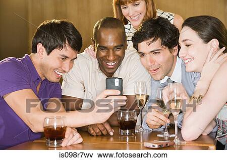 Five friends in a bar View Large Photo Image Stock Photo - Five friends in a bar. Fotosearch