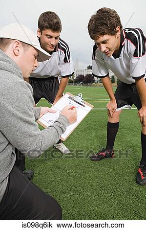 Football team and coach View Large Photo Image Stock Image - Football team and coach. Fotosearch