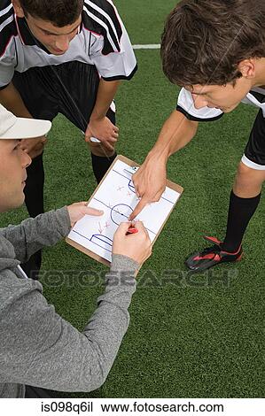 Football team and coach View Large Photo Image Stock Image - Football team and coach. Fotosearch