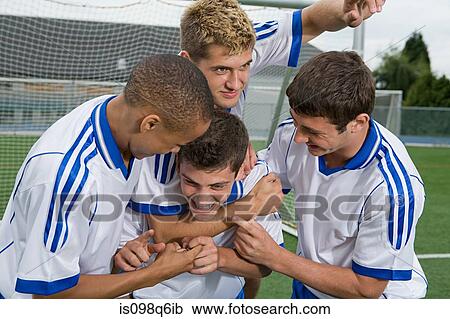 Footballers celebrating View Large Photo Image Stock Image - Footballers celebrating. Fotosearch