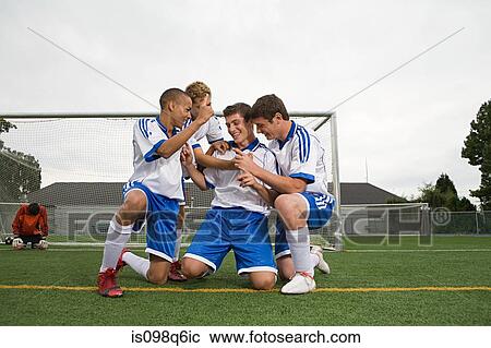 Footballers celebrating View Large Photo Image Stock Image - Footballers celebrating. Fotosearch
