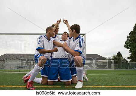 Footballers celebrating View Large Photo Image Stock Image - Footballers celebrating. Fotosearch