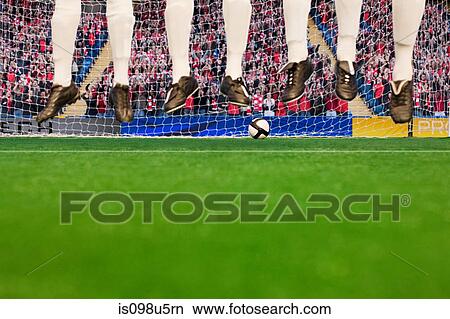Picture - Free kick during a football match. Fotosearch