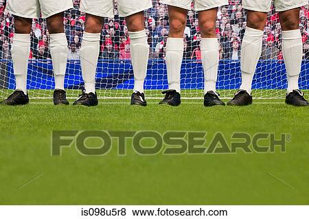 Stock Photo - Free kick during a football match. Fotosearch