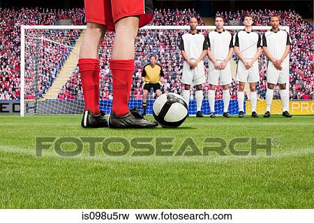 Free kick during a football match View Large Photo Image Stock Photo - Free kick during a football match. Fotosearch