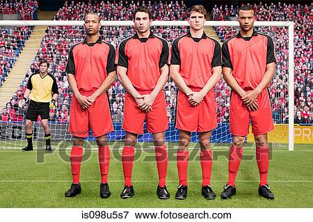 Stock Photo - Free kick during a football match. Fotosearch