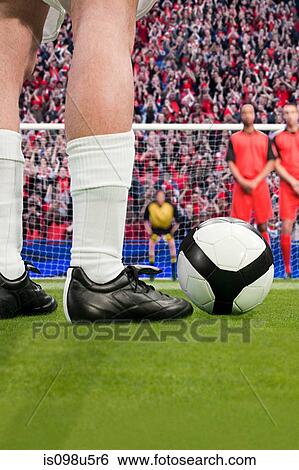 Free kick during a football match View Large Photo Image Stock Photograph - Free kick during a football match. Fotosearch