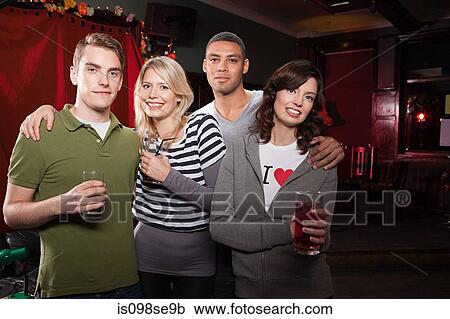 Stock Image - Friends in a bar. Fotosearch