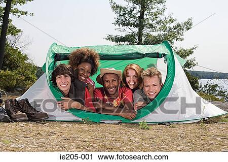 Friends in a tent View Large Photo Image Stock Image - Friends in a tent. Fotosearch