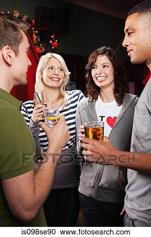 Friends in bar View Large Photo Image Stock Image - Friends in bar. Fotosearch