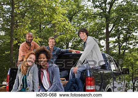 Stock Photo - Friends on a road trip. Fotosearch