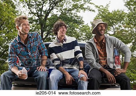 Friends on pickup truck View Large Photo Image Picture - Friends on pickup truck. Fotosearch