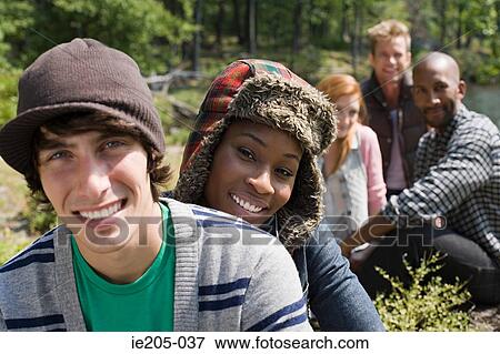 Stock Photo - Friends smiling. Fotosearch