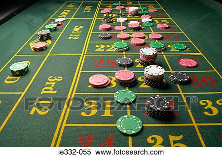 Gambling chips on a roulette table View Large Photo Image Stock Photography - Gambling chips on a roulette table. Fotosearch