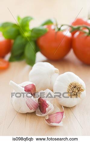 Garlic and tomatoes View Large Photo Image Stock Image - Garlic and tomatoes. Fotosearch