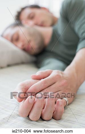 Picture - Gay couple sleeping. Fotosearch