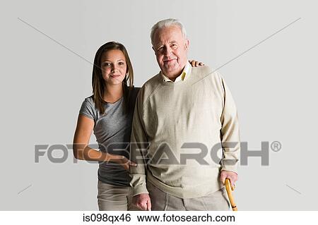 Stock Photograph - Girl and granddad. Fotosearch
