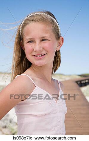 Girl at the coast View Large Photo Image Stock Photo - Girl at the coast. Fotosearch