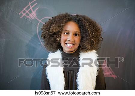Girl by blackboard View Large Photo Image Stock Photo - Girl by blackboard. Fotosearch