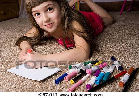 Girl drawing View Large Photo Image Stock Photo - Girl drawing. Fotosearch