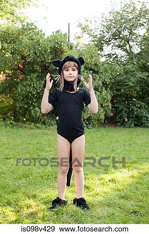 Girl dressed as cat View Large Photo Image Stock Photo - Girl dressed as cat. Fotosearch