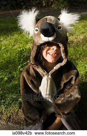 Stock Image - Girl dressed as koala. Fotosearch