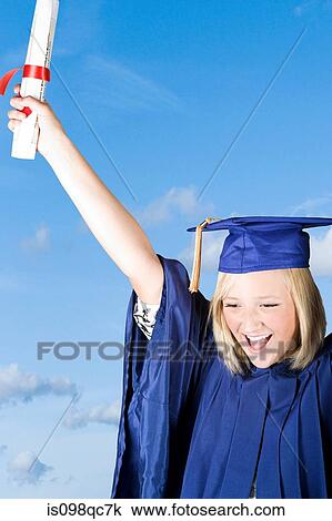 Stock Image - Girl graduating high school. Fotosearch