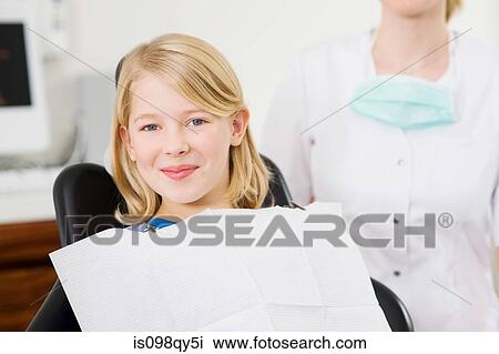 Girl in dentists office View Large Photo Image Stock Image - Girl in dentists office. Fotosearch