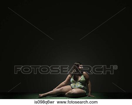Girl sitting on floor View Large Photo Image Stock Photography - Girl sitting on floor. Fotosearch