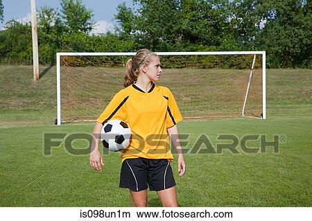 Girl soccer player with ball View Large Photo Image Picture - Girl soccer player with ball. Fotosearch
