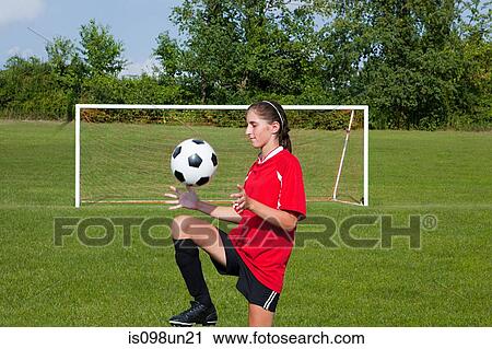 Girl soccer player with ball View Large Photo Image Stock Image - Girl soccer player with ball. Fotosearch