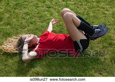 Girl soccer player with injury View Large Photo Image Stock Photo - Girl soccer player with injury. Fotosearch