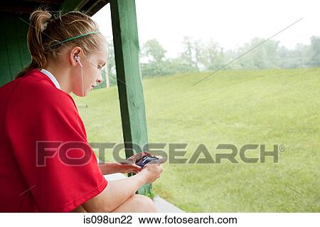Girl soccer player with mp3 player View Large Photo Image Stock Image - Girl soccer player with mp3 player. Fotosearch