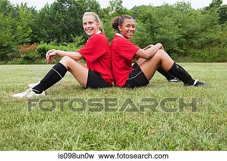 Girl soccer players back to back View Large Photo Image Stock Photo - Girl soccer players back to back. Fotosearch