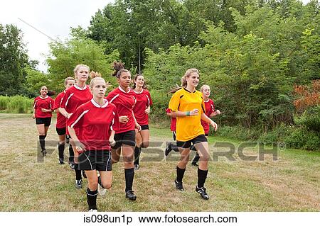 Girl soccer players running View Large Photo Image Stock Photography - Girl soccer players running. Fotosearch