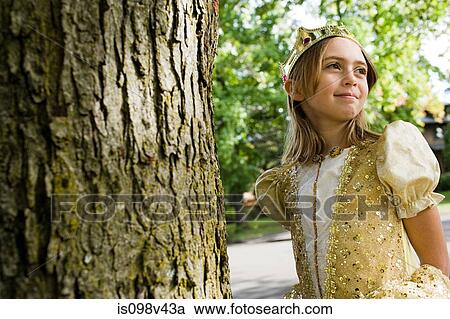 Girl wearing crown dressed up as queen View Large Photo Image Stock Image - Girl wearing crown dressed up as queen. Fotosearch