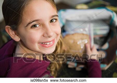 Girl with a sandwich View Large Photo Image Stock Photo - Girl with a sandwich. Fotosearch