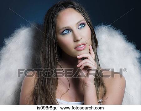 Stock Photograph - Girl with angel wings. Fotosearch