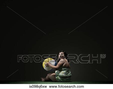 Girl with beach ball View Large Photo Image Stock Photo - Girl with beach ball. Fotosearch