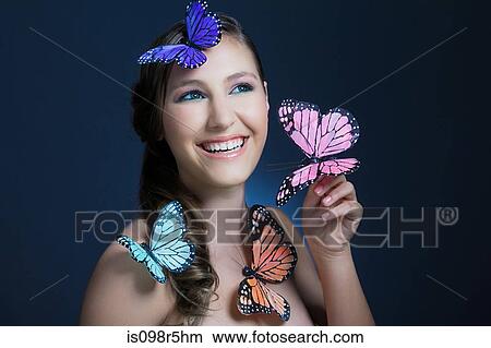 Girl with butterflies View Large Photo Image Picture - Girl with butterflies. Fotosearch