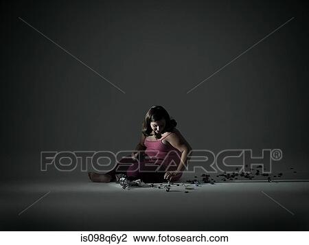 Stock Image - Girl with candy. Fotosearch