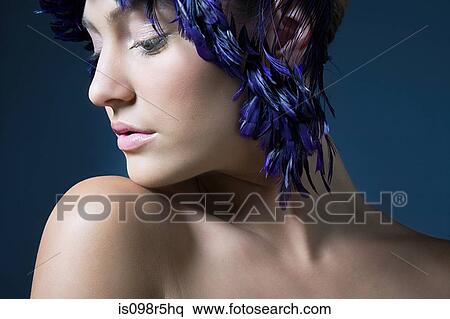 Stock Photography - Girl with feather headdress. Fotosearch