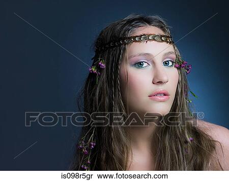 Girl with flowers in hair View Large Photo Image Stock Photography - Girl with flowers in hair. Fotosearch