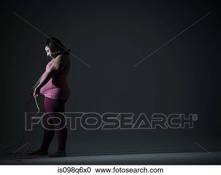 Girl with skipping rope View Large Photo Image Stock Image - Girl with skipping rope. Fotosearch