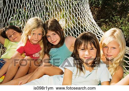 Girls in a hammock View Large Photo Image Picture - Girls in a hammock. Fotosearch