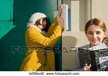 Girls outside school View Large Photo Image Stock Image - Girls outside school. Fotosearch