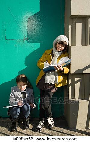 Stock Photograph - Girls outside school. Fotosearch