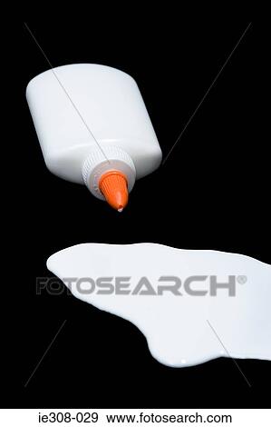 Glue spilling out of a bottle View Large Photo Image Stock Photo - Glue spilling out of a bottle. Fotosearch