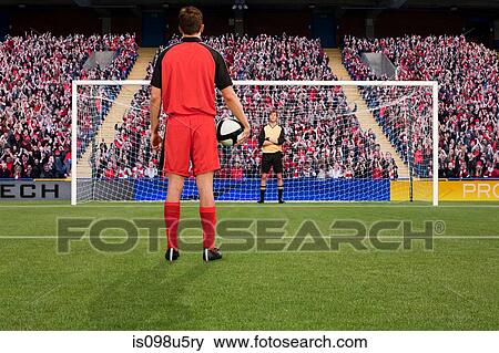 Stock Photo - Goalkeeper anticipating free kick. Fotosearch