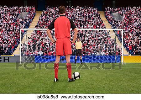 Stock Photo - Goalkeeper anticipating free kick. Fotosearch